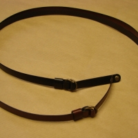 leather ribbon / metal buckle